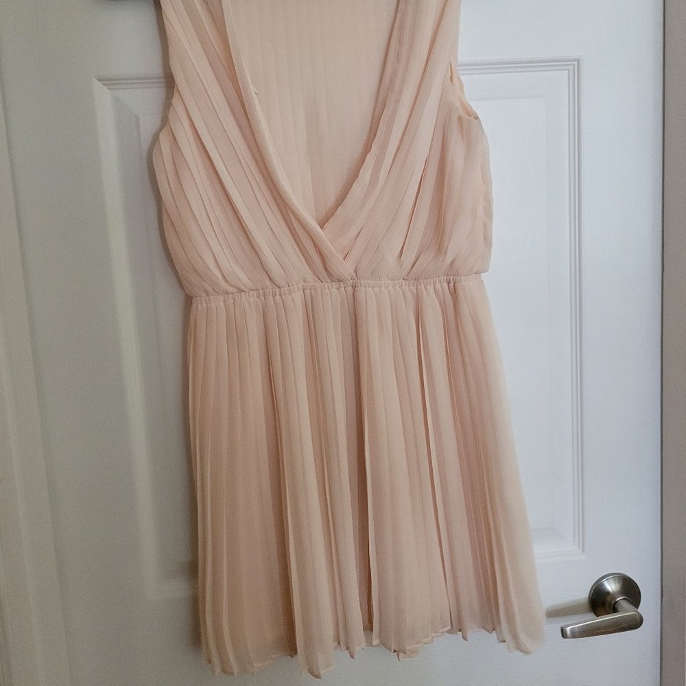 Blush pleated mini dress backless
